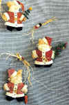 Santa critters.  Pattern includes 6" rabbit, bear or kitty, each holding a different Christmas tree.