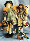 Pansy.  Pattern includes 2 different 22" gardening angel dolls with yo yo flowers.